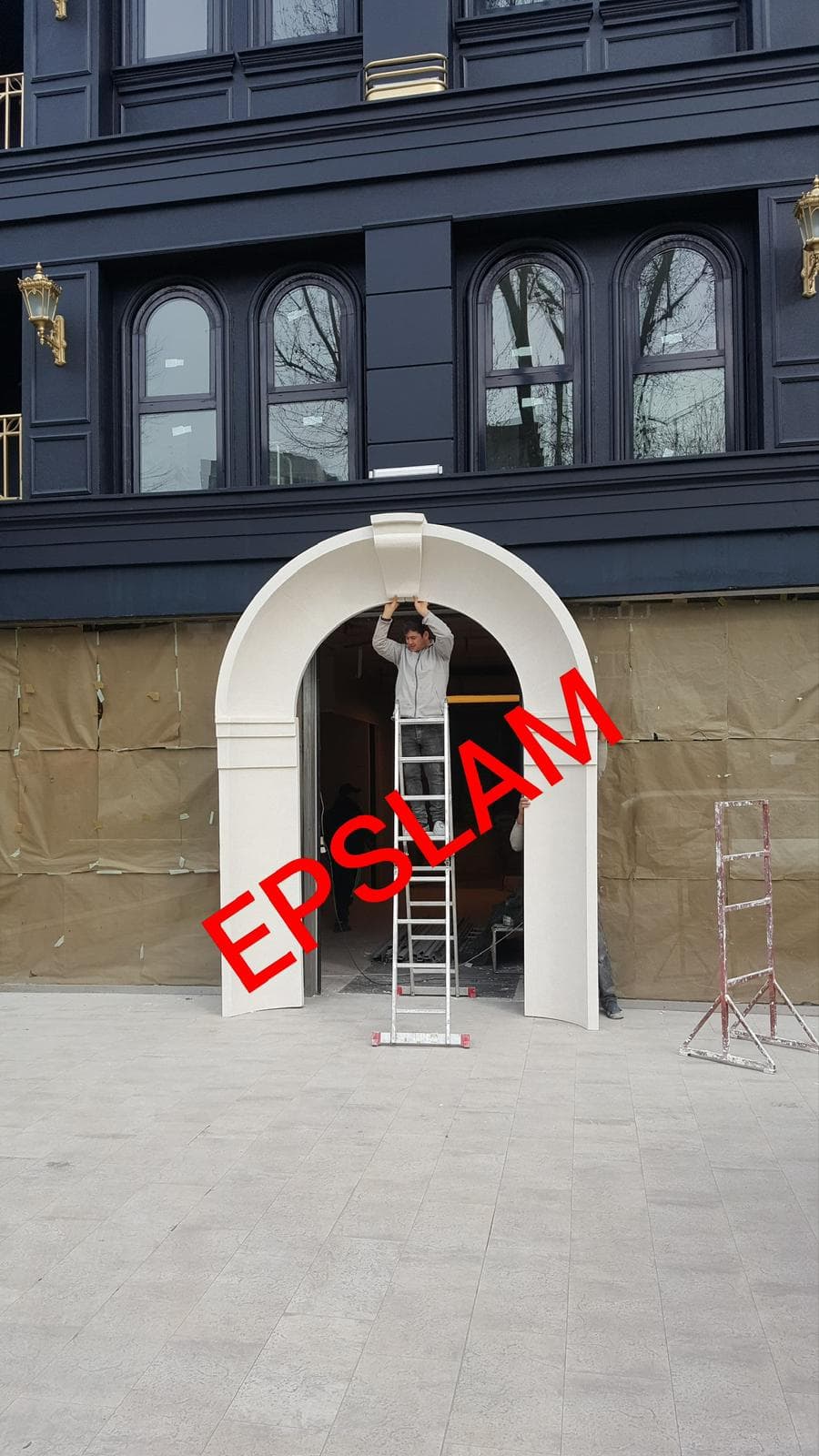 EPSLAM branded decorative storefront arch produced for a commercial installation